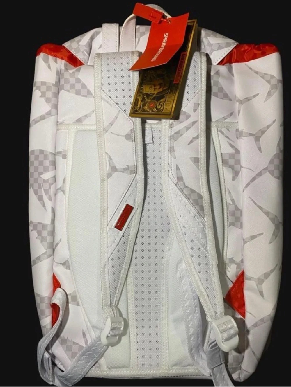 Sprayground White Shark-Pattern Buckle Backpack with Orange Accents